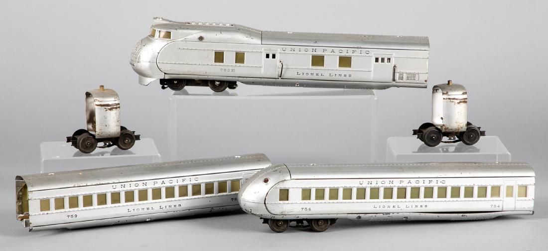 Lionel three-piece Union Pacific train set: Lionel three-piece Union Pacific train set, 0 gauge, to include a#752E engine, #753 passenger car and #754 observation, together with sections of track. Provenance: Estate of Jonathan Barrow, Los Ange