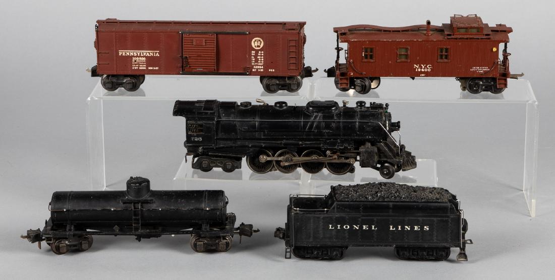 Lionel five-piece train set: Lionel five-piece train set, 0 gauge, to include a#726 locomotive, #2426W tender, #2599 tanker, box car, and #2957 caboose, engine is 11 1/2'' l. Provenance: Estate of Jonathan Barrow, Los Angeles, Ca