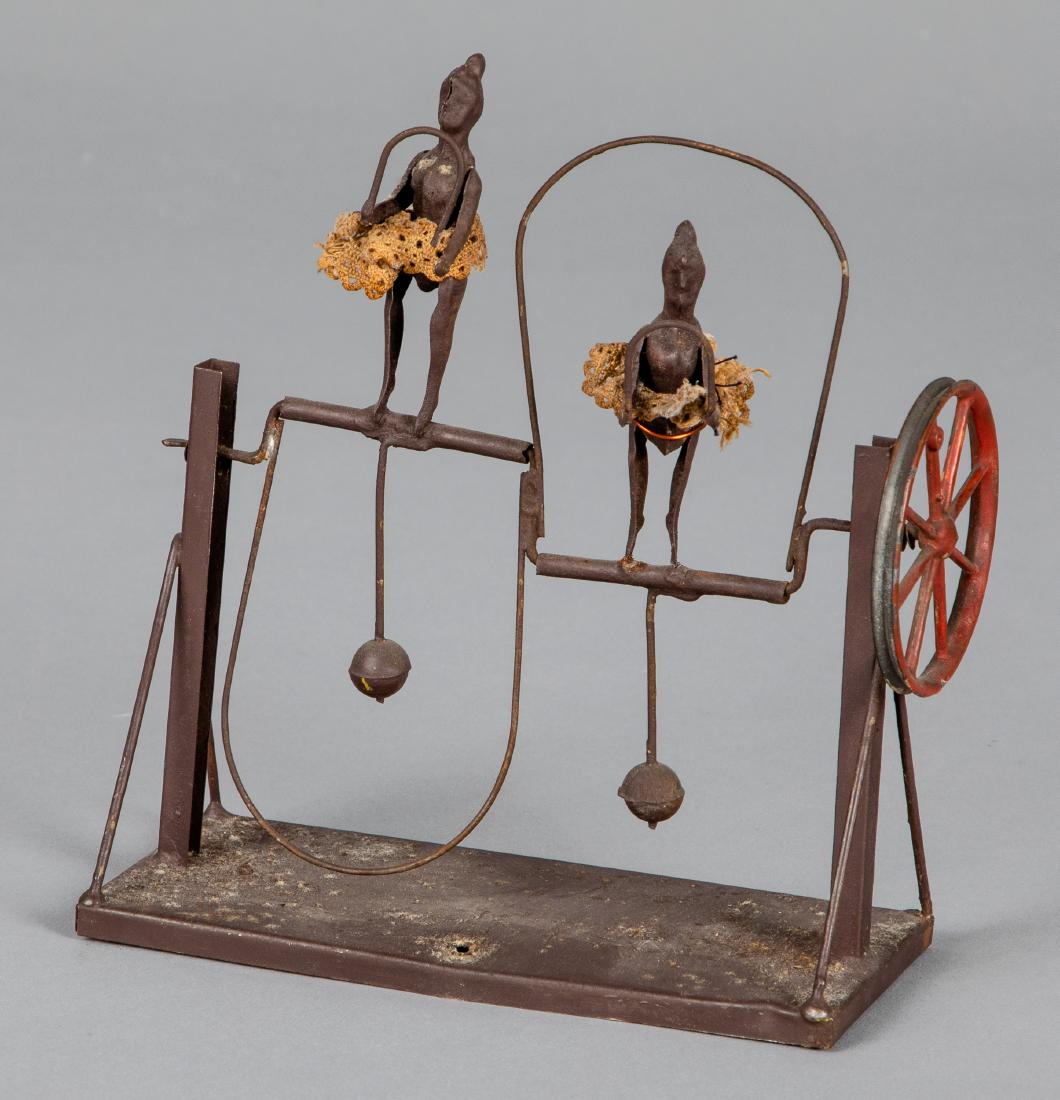 Carette painted tin ballerinas steam toy accessory: Carette painted tin ballerinas steam toy accessory, the figures with lace tutus, 6'' h. Pictured in Morton A. Hirschberg Steam Toys - A Symphony in Motion, page 94. Provenance: Morton A. Hirschberg.