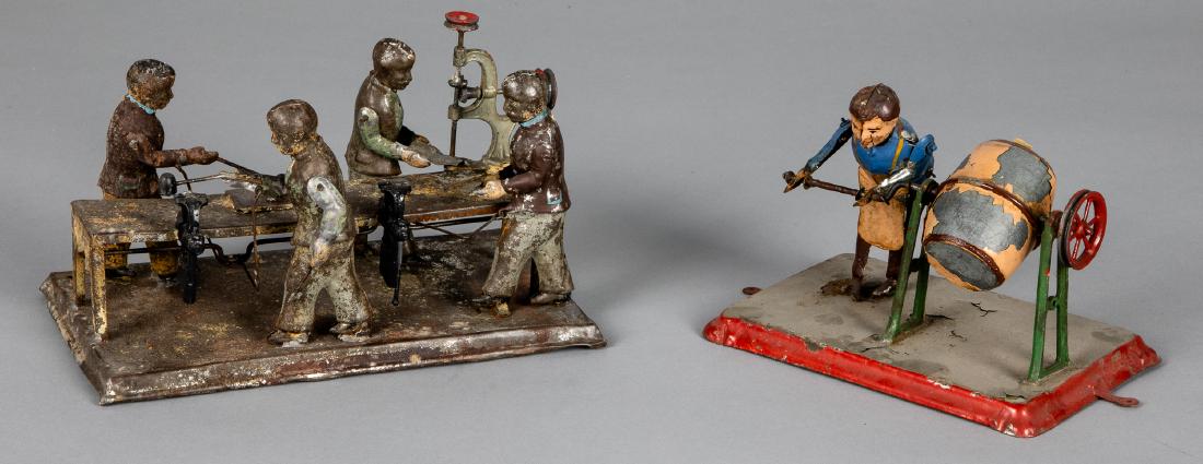 Painted tin four man workshop steam toy accessory: Painted tin four man workshop steam toy accessory, probably Carette, 5 3/4'' h., 9'' w., together with a butter maker, 5 1/2'' h., 6 3/4'' w. churner Pictured in Morton A. Hirschberg Steam Toys - A Sy