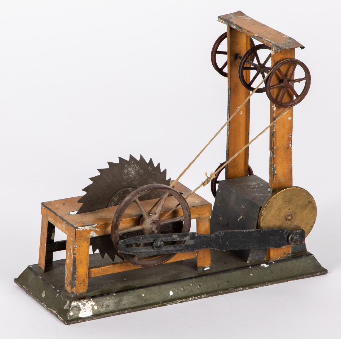 Large painted tin sawmill steam toy accessory: Large painted tin sawmill steam toy accessory, probably Carette, 7 1/2'' h., 9'' w. Pictured in Morton A. Hirschberg Steam Toys - A Symphony in Motion, page 77. Provenance: Morton A. Hirschberg.