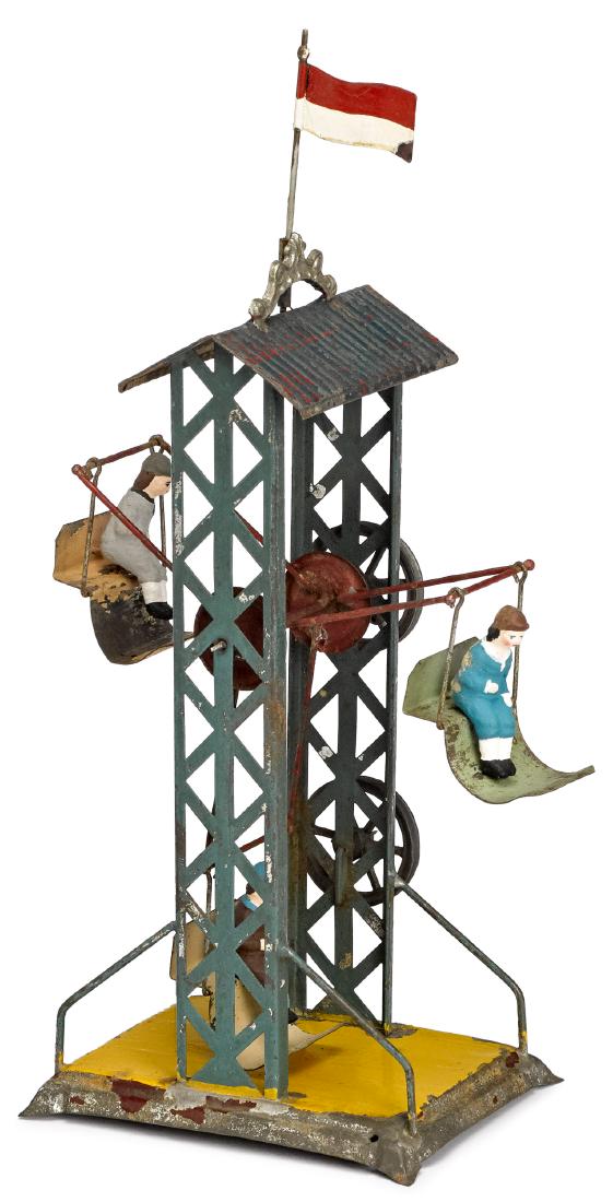 Painted tin Ferris wheel steam toy accessory: Painted tin Ferris wheel steam toy accessory, with three seats, each with a painted composition rider, 11'' h. Provenance: Morton A. Hirschberg Steam Toy Collection.