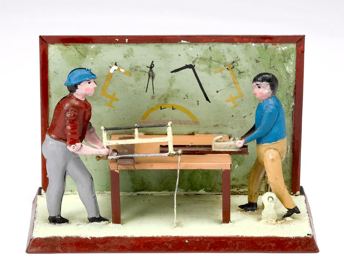 Becker painted tin tool shop steam toy accessory: Becker painted tin tool shop steam toy accessory, #40/1, having one man with a bow saw, the other with a plane, 5 1/4'' h., 8'' w. Pictured in Morton A. Hirschberg Steam Toys - A Symphony in Motion, p