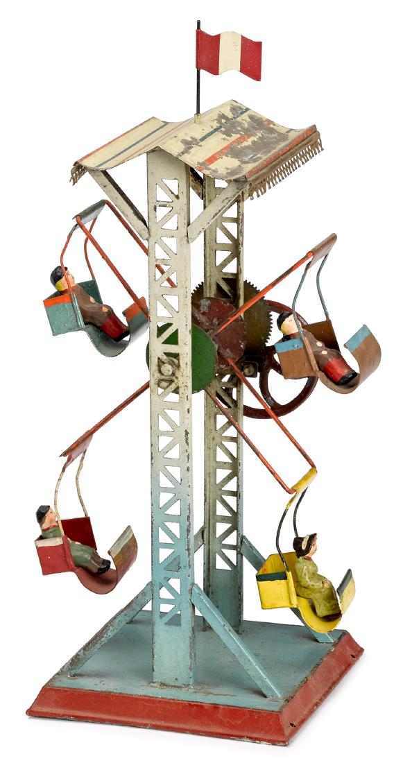Doll painted tin Ferris wheel steam toy accessory: Doll painted tin Ferris wheel steam toy accessory, with four seats, each with a painted composition figure, 12 3/4'' h. Pictured in Morton A. Hirschberg Steam Toys - A Symphony in Motion, page 129. Pr
