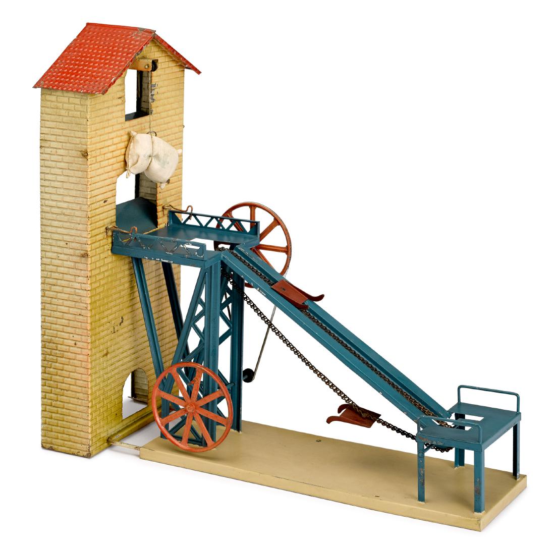 Bing mill steam toy accessory: Bing painted and tin lithograph mill steam toy accessory, with hand crank, 14 3/4'' h., 16'' w. Provenance: Morton A. Hirschberg Steam Toy Collection.