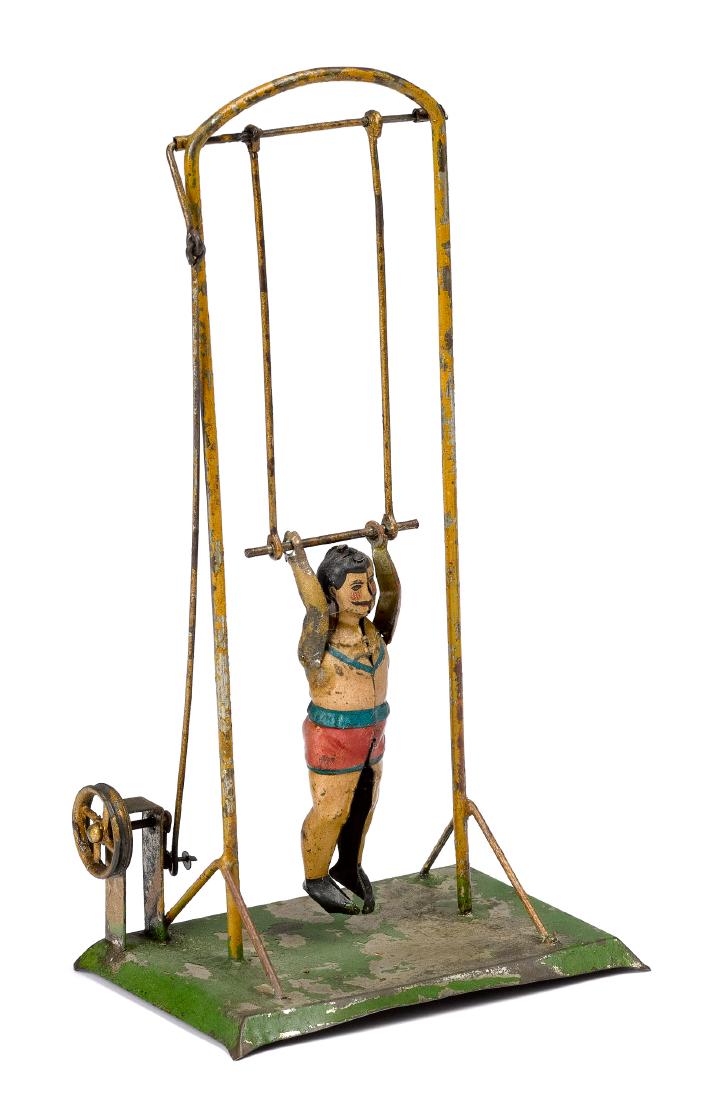 Acrobat steam toy accessory: Painted and lithograph tin acrobat steam toy accessory, probably Arnold, 9 1/2'' h. Pictured in Morton A. Hirschberg Steam Toys - A Symphony in Motion, page 19. Provenance: Morton A. Hirschberg Steam 
