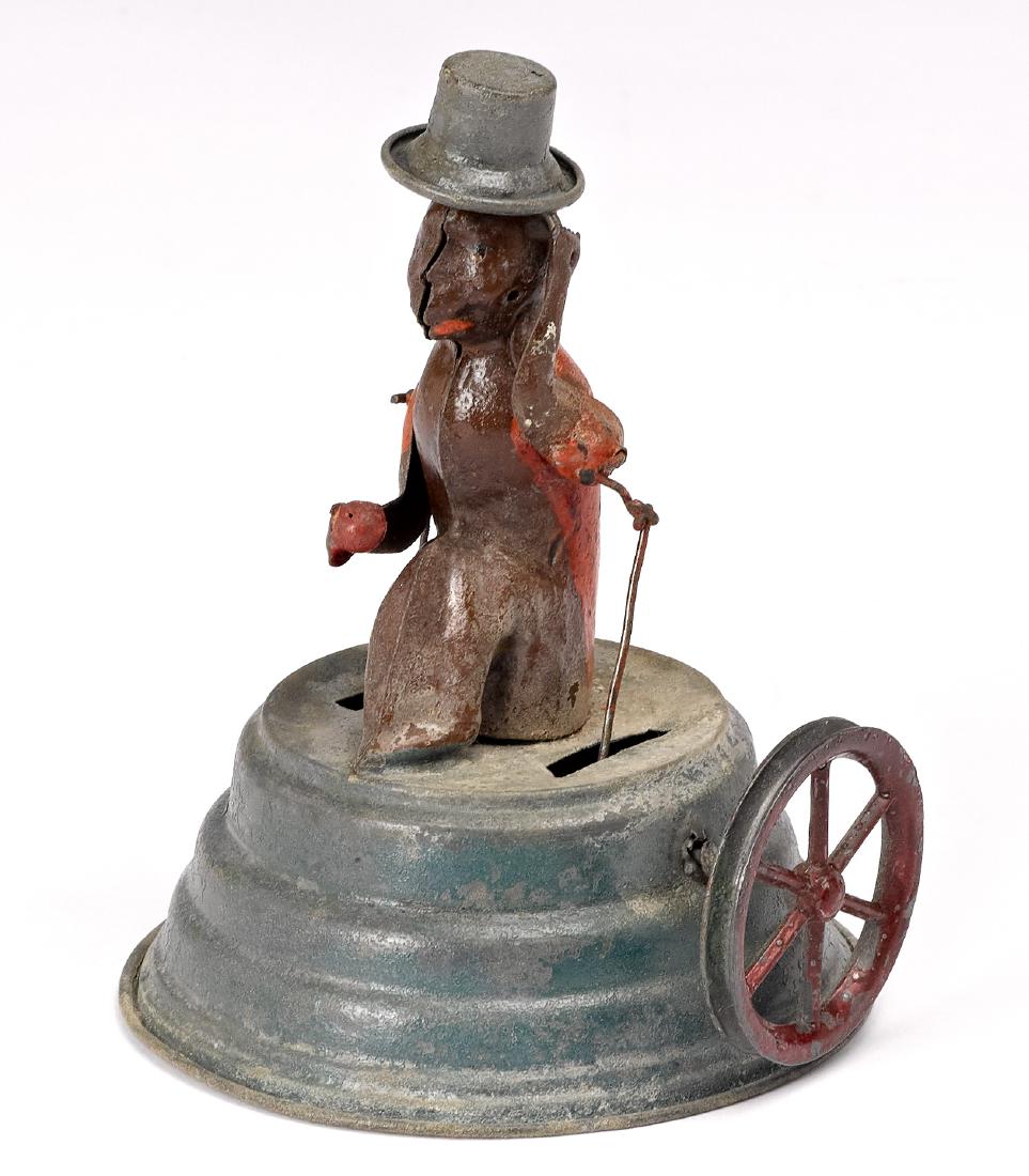 Painted tin monkey tipping hat steam toy accessory: Painted tin monkey tipping hat steam toy accessory, 4 1/2'' h. Pictured in Morton A. Hirschberg Steam Toys - A Symphony in Motion, page 222. Provenance: Morton A. Hirschberg Steam Toy Collection.