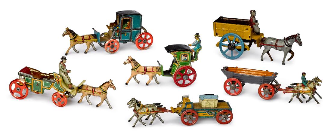 Six tin lithograph horse drawn penny toys: Six tin lithograph horse drawn penny toys, to include one with a military boat, a cart, and carriages, longest - 5''.