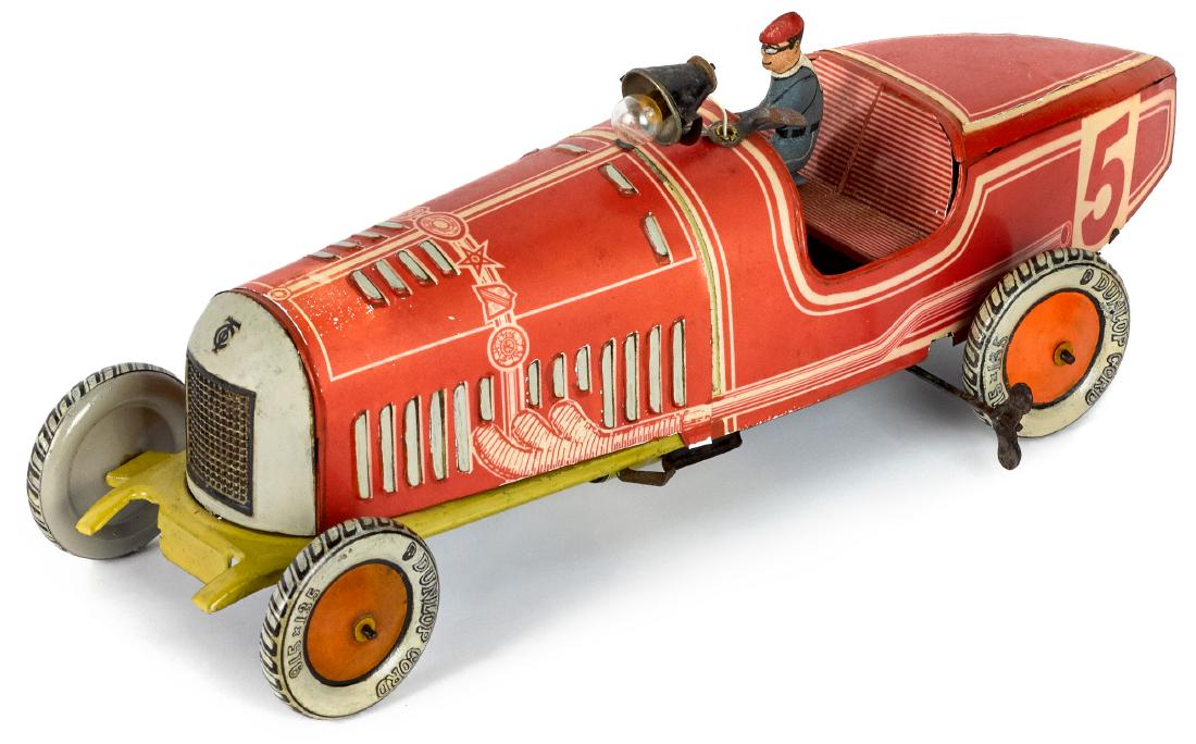 Tippco tin lithograph wind-up boat tail racer: Tippco tin lithograph wind-up boat tail racer, with battery operated light and driver, 15 3/4'' l.