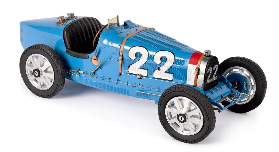 Bugatti hand-built model race car: French Art Collection T35 Bugatti hand-built model race car, made by master car builder J. P. Fontenelle, with leather straps, 1/8th scale, 19'' l.