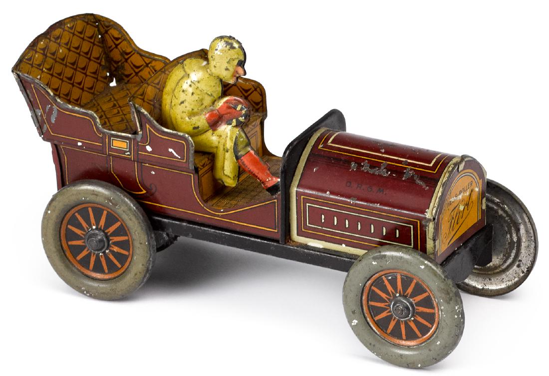 Hess-Roller Flirt tin lithograph flywheel racer: Hess-Roller Flirt tin lithograph flywheel racer, with tin lithograph driver with racing suit and goggles, 5 1/2'' l.