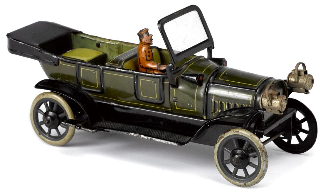 Fischer tin lithograph wind-up touring car: Fischer tin lithograph wind-up touring car, with tin lithograph driver and head lamps, 8 5/8'' l.