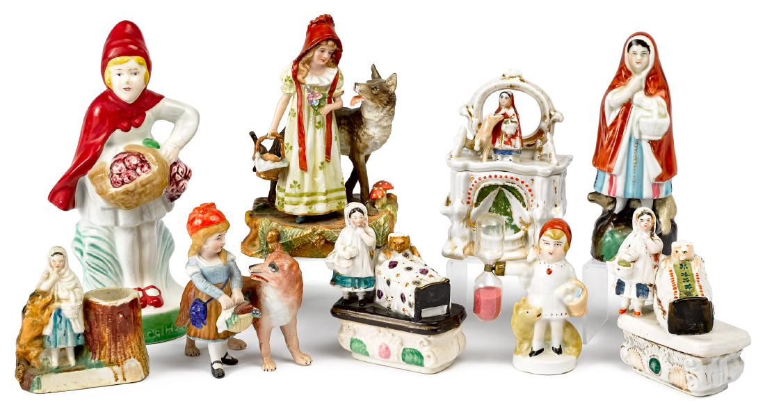 Little Red Riding Hood porcelain figures: Group of Little Red Riding Hood porcelain and bisque figures, to include faring boxes, a match holder, an egg timer, a laundry shaker, etc., tallest - 8''.
