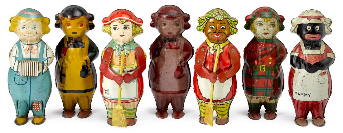 Seven Lindstrom tin lithograph wind-up wobblers: Seven Lindstrom tin lithograph wind-up wobblers, to include two sweeping, two Betty, a Dancing Lassie, a boy with a squeeze box, and a Black Americana Mammy, 8'' h.