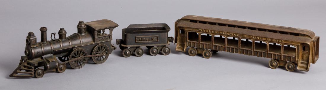 Ideal cast iron three-piece Wabash RR train set: Ideal cast iron three-piece Wabash RR train set, to include a #154 locomotive, 12'' l., a tender and a passenger car.