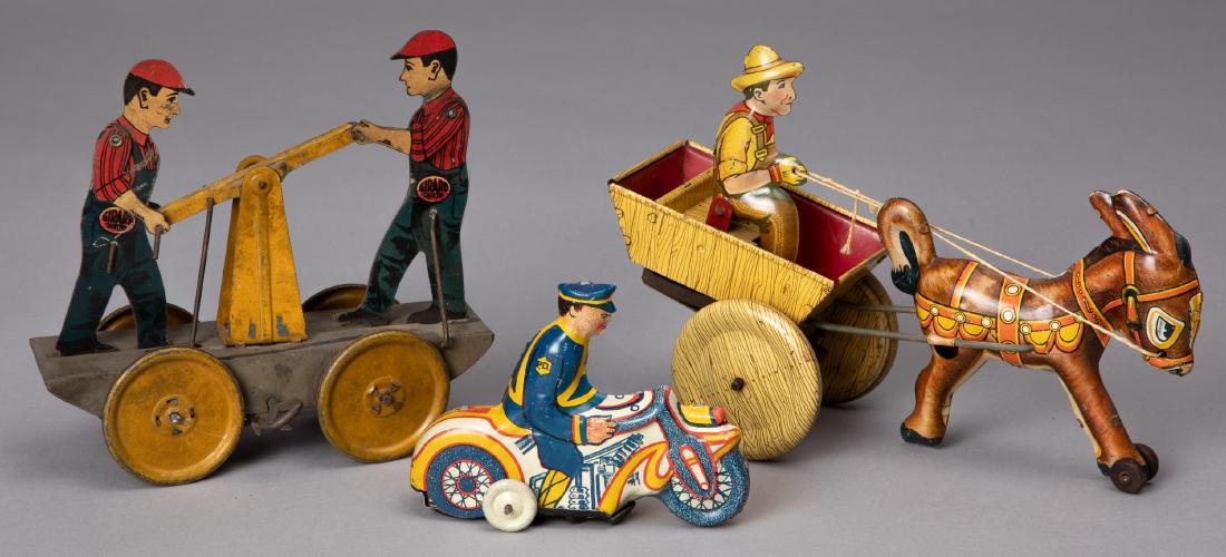 Three tin lithograph wind-up toys: Three tin lithograph wind-up toys, to include a Girard hand car, a Marx policeman motorcycle and a Marx donkey cart, 8'' l.
