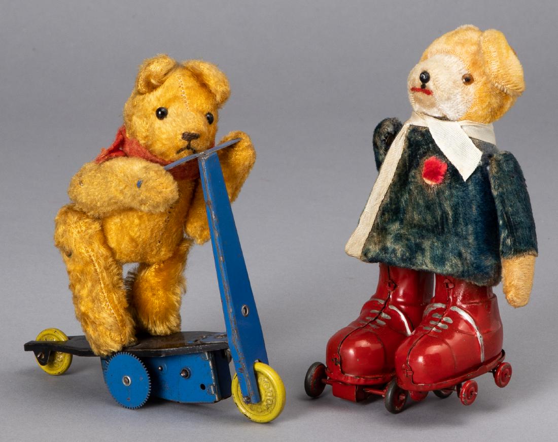 Two wind-up bears: Two wind-up bears, to include a German bear riding a scooter, 5 3/4'' h. and a Japanese roller skating bear, 6'' h.