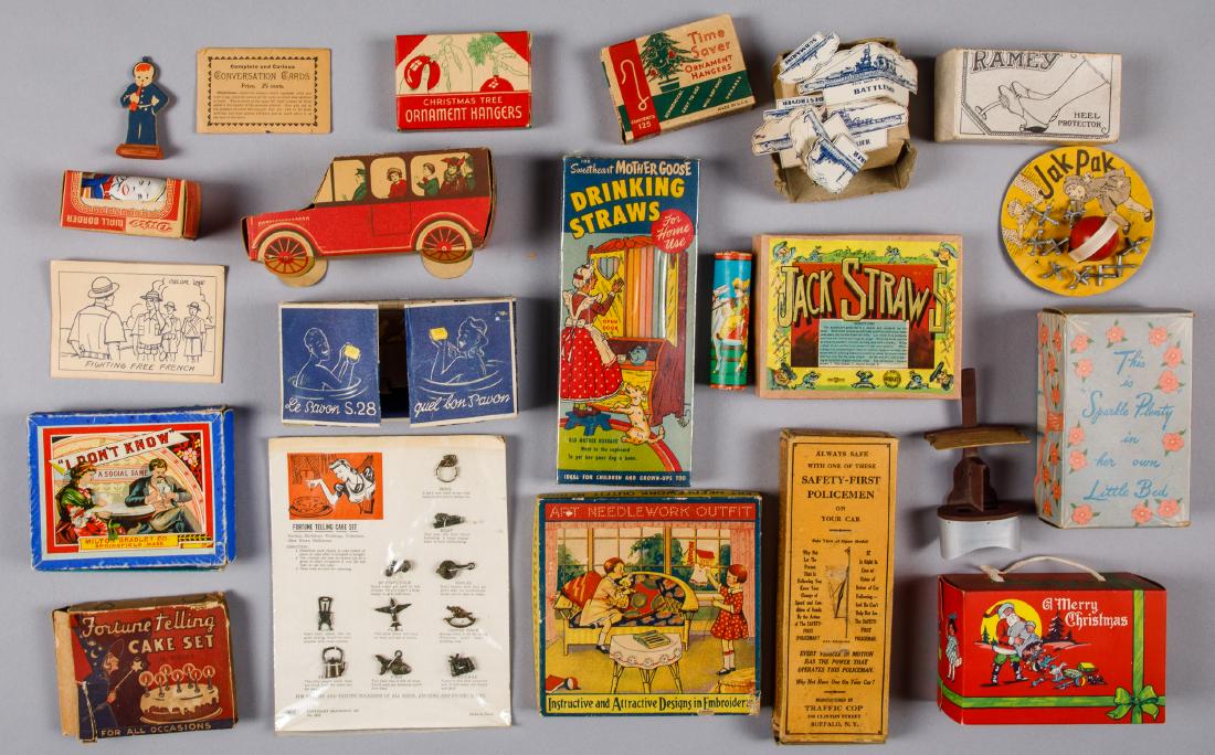Collection of puzzles and games: Collection of puzzles and games, to include Jacks, Merry Christmas box, miniature stereo viewer, Safety First policeman box, Jack Straws, etc.