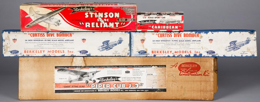 Four boxed Berkeley airplane kits: Four boxed Berkeley airplane kits, to include two Curtis Dive Bomber, 24'' wingspan, a Stinson SR-9C Reliant, 42'' wingspan and a Piper Cub J-3, together with a Packard Caribbean car model.
