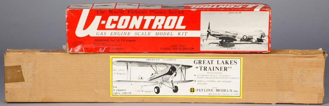 Two vintage airplane model kits: Two vintage airplane model kits, to include a Kyosho gas engine model kit Spitfire 5B, unbuilt, and a Flyline Great Lakes Trainer, unbuilt, 40'' wingspan.