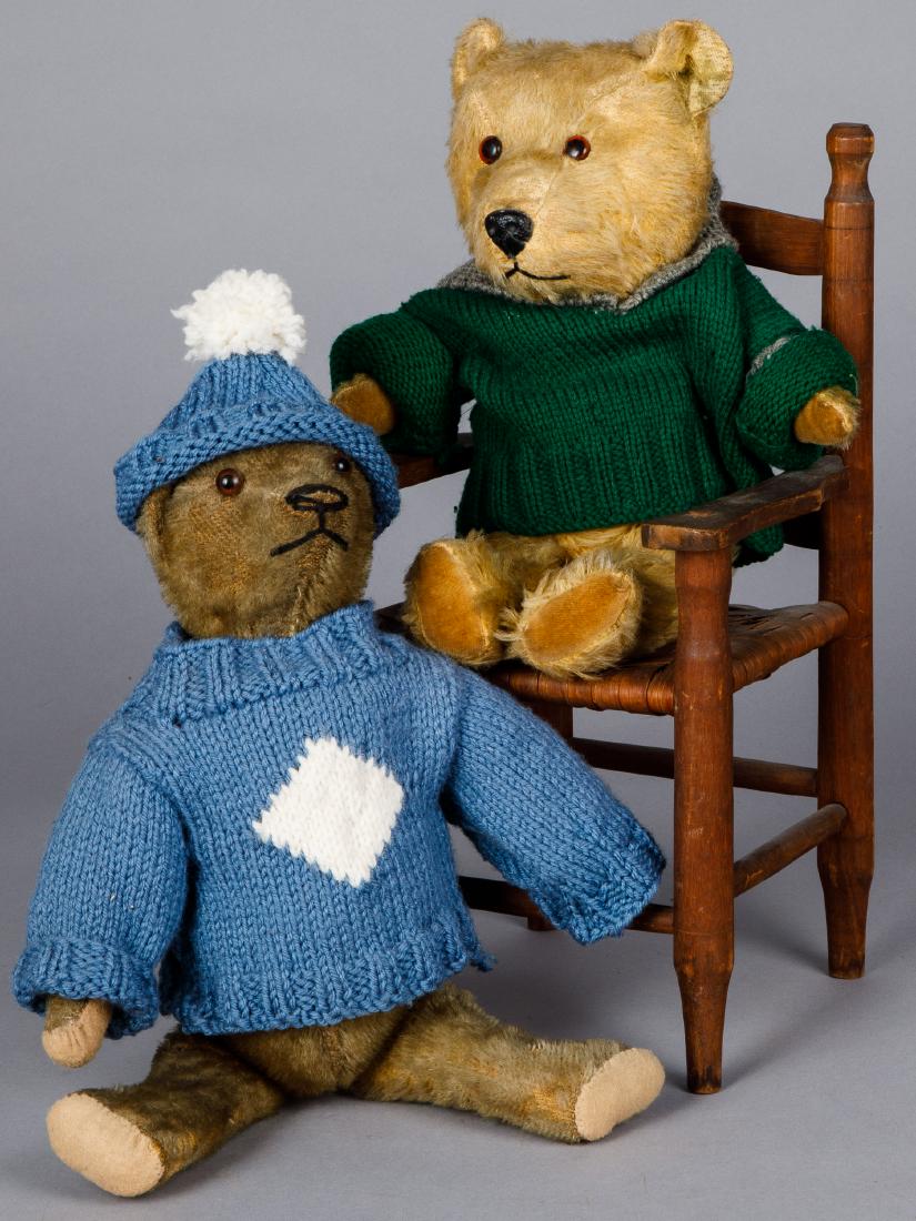 Two mohair teddy bears: Two mohair teddy bears, one labeled Chiltern, with glass eyes and a molded composition nose, 13 1/2'' h., the other with glass eyes and elongated limbs, 14'' h., together with a stained red rush seat