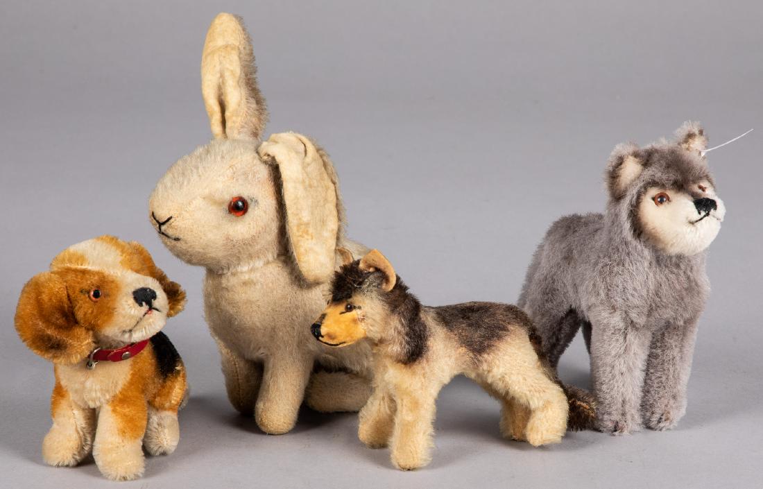 Three vintage mohair animals, etc.: Three vintage mohair animals, to include a German Shepard, a beagle and a rabbit, together with a contemporary Steiff wolf, tallest - 5 1/2''.