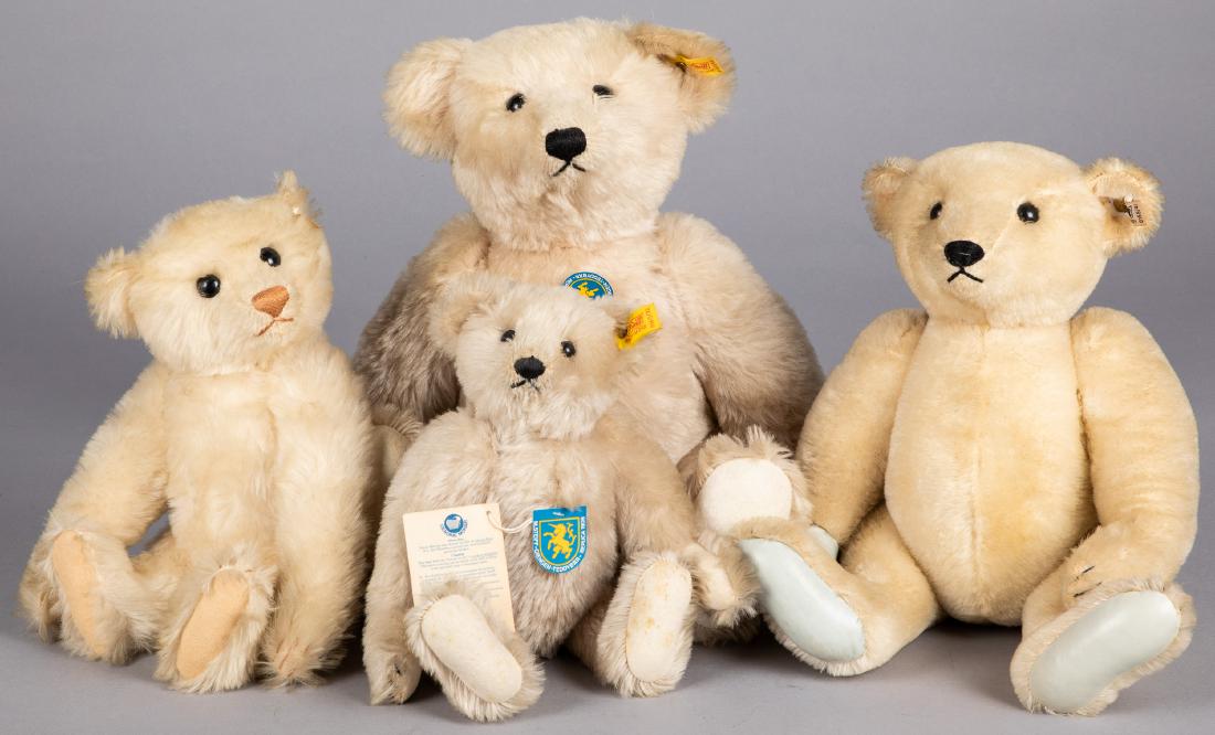 Four Steiff mohair teddy bears: Four Steiff mohair teddy bears, with ear buttons and ribbons, to include two Limited Edition and two 1906 replicas, tallest - 19''.