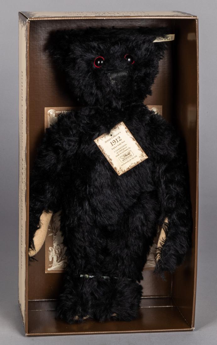 British Collectors 1912 replica black teddy bear: Steiff mohair British Collectors 1912 replica black teddy bear, with original box, 19'' h.