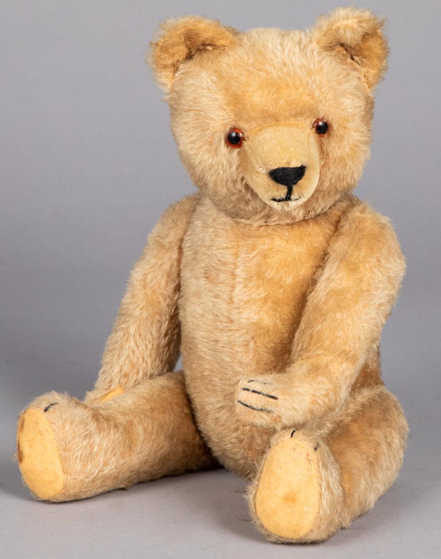 Mohair teddy bear: Mohair teddy bear, ca. 1950's, probably Steiff, with glass eyes and sewn claws, 17'' h.