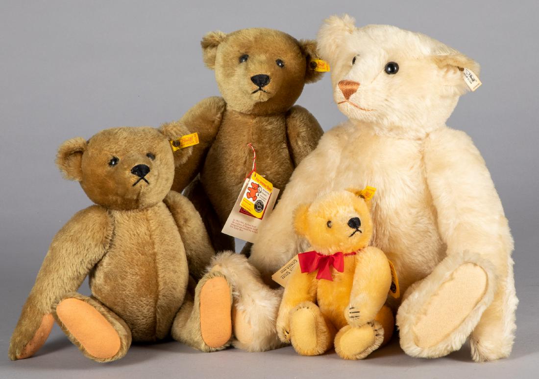 Four Steiff teddy bears: Four Steiff teddy bears, with ear buttons and ribbons, tallest - 21''.