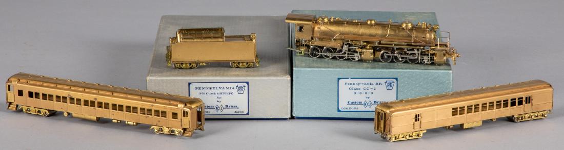 Two NJ Custom Brass HO scale train locomotives: Two NJ Custom Brass HO scale train locomotives, in the original boxes, to include a PRR P70 coach & M70 RPO set, 10 3/4'' l. and PRR class CC-2, 0-8-8-0 locomotive.