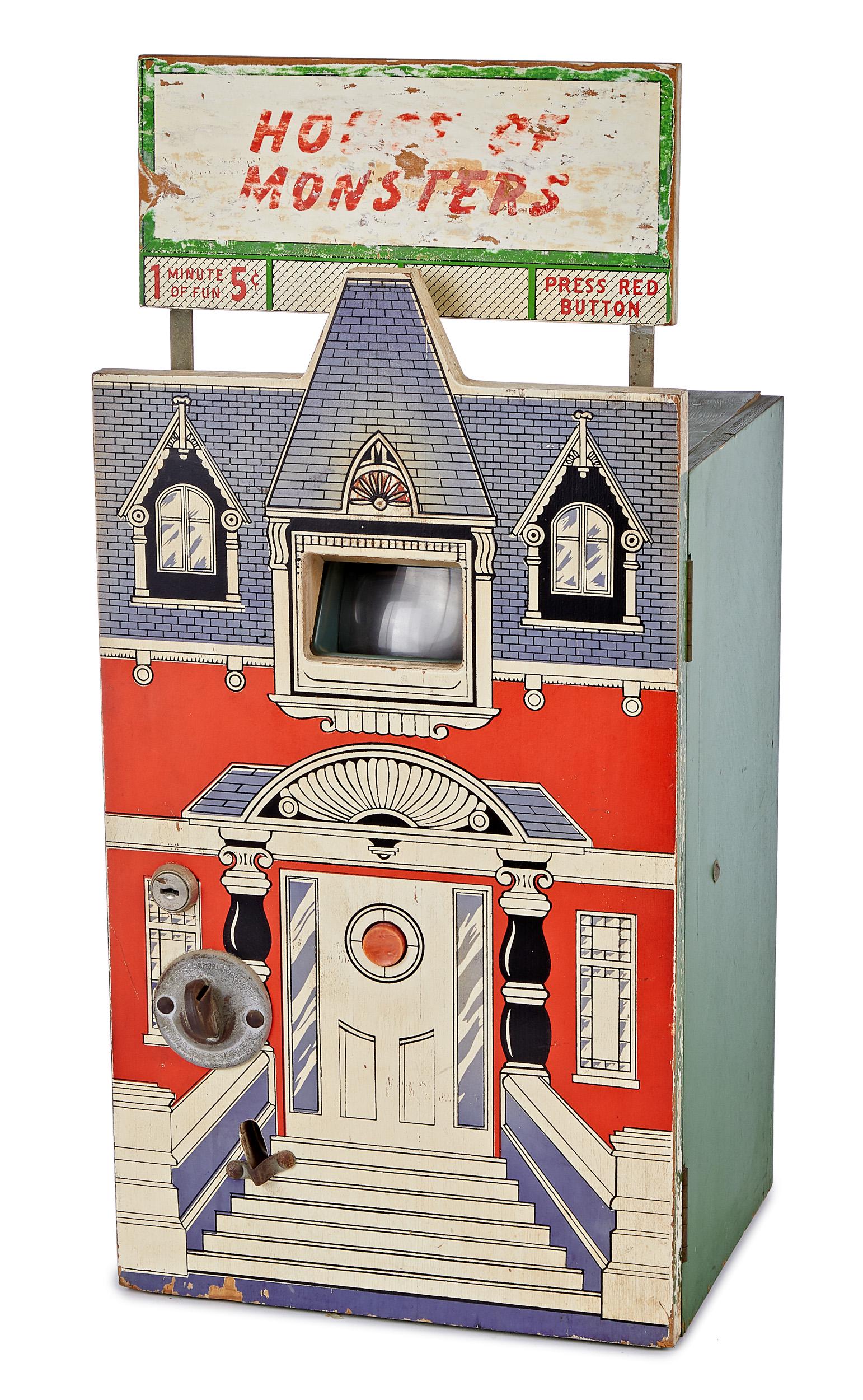House of Monsters penny arcade slide viewer: House of Monsters penny arcade slide viewer, nickel machine, with red button advancing 35mm slides, 26 1/2'' h., 12'' w.