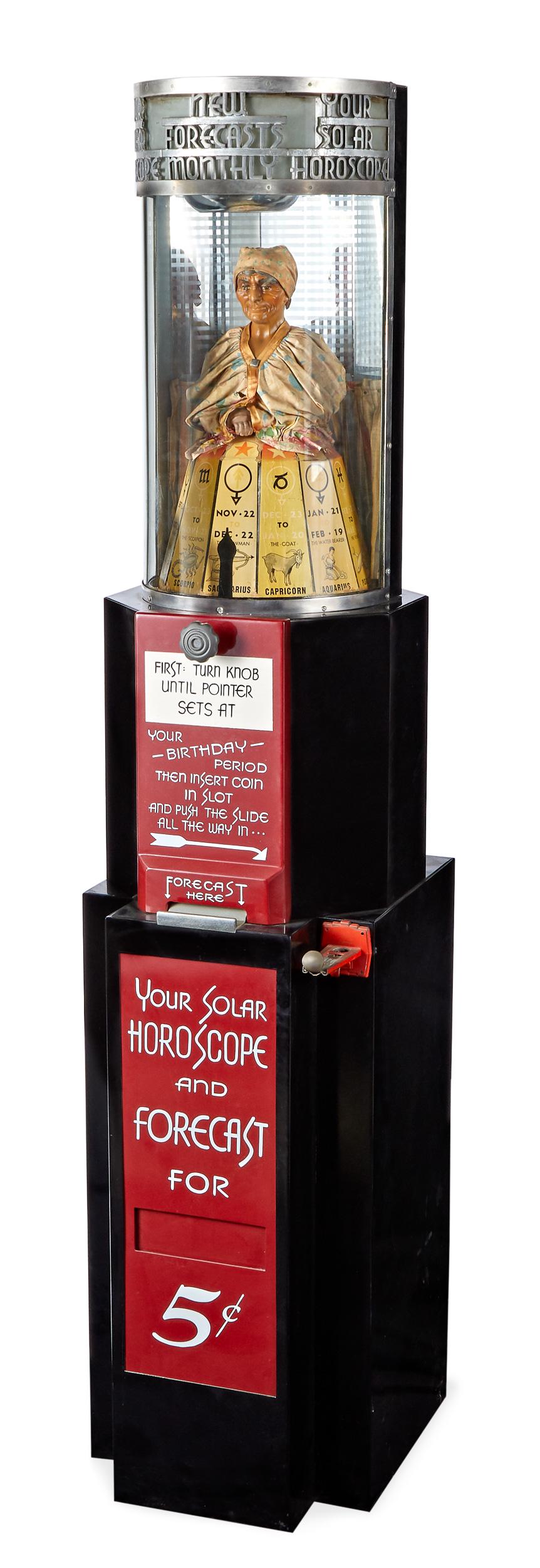 Peerless Fortune Teller Solar horoscope machine: Peerless Weighing and Vending Machine Corp. Grandma Fortune Teller Solar horoscope nickel machine, mid 20th c., with a gypsy over a rotating paper lithograph cylinder, 77'' h., 17'' w.
