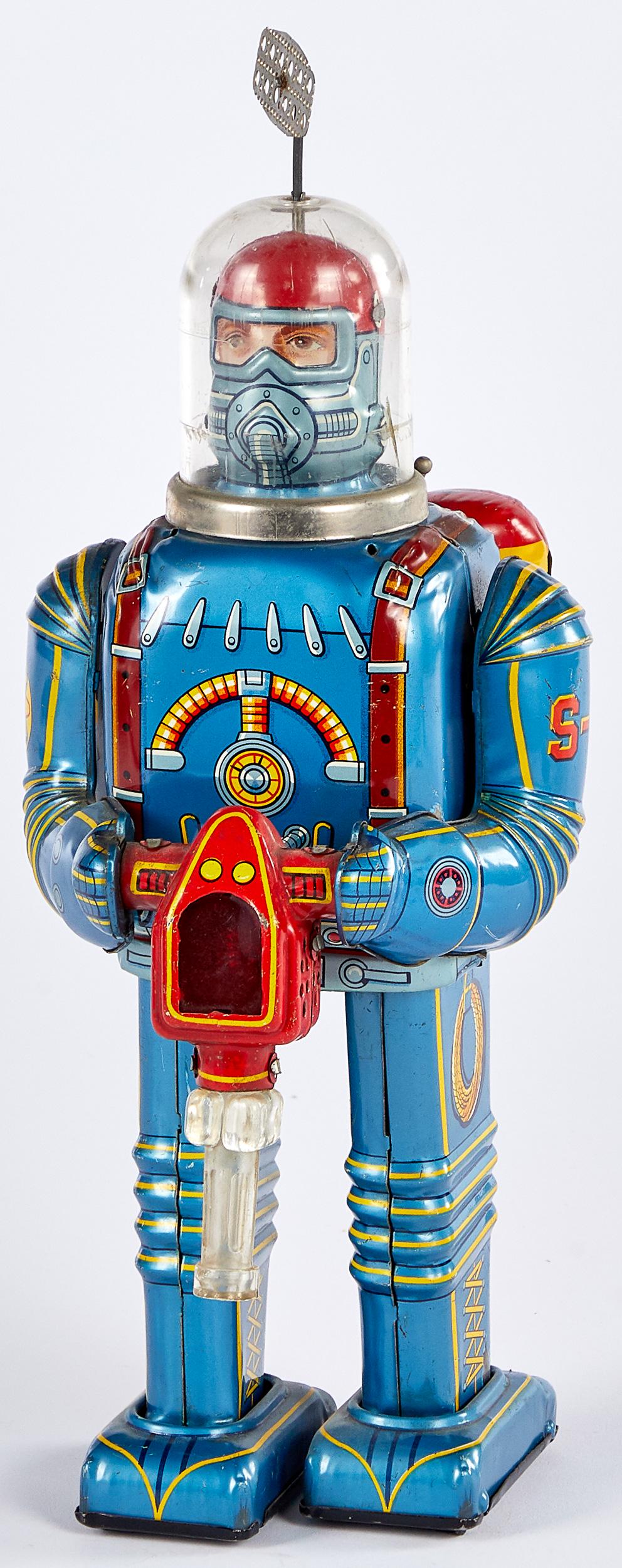 Japanese Daiya Space Conqueror robot battery op: Japanese Daiya tin lithograph battery operated Space Conqueror robot, with oxygen tanks and a ray gun, 12'' h.