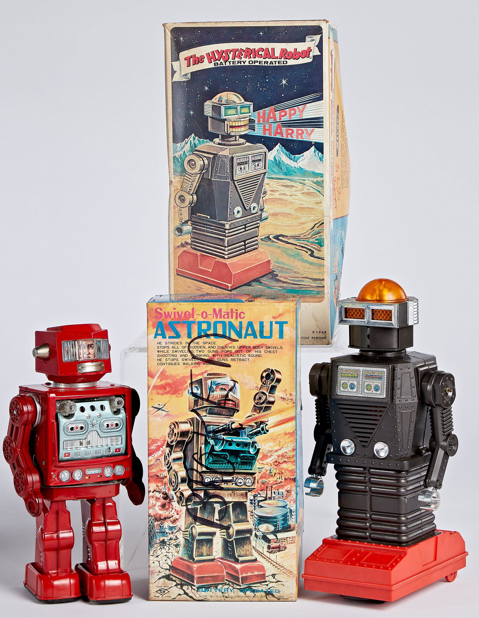 Two Japanese battery operated robots: Two Japanese battery operated robots, in the original boxes, to include Swivel-o-matic, 11 1/2'' h. and a Straco The Hysterical Robot, the box dated 1969, 13 1/2'' h.