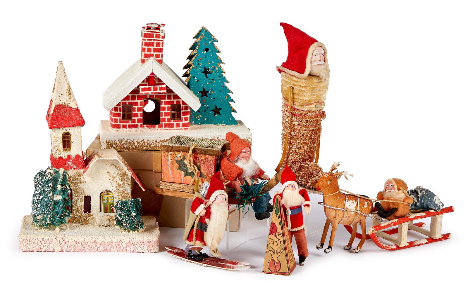 Group of Japanese Santa Claus candy containers et: Group of Japanese Santa Claus candy containers and accessories, to include two figures in sleighs, a triangle candy box, a pipe cleaner boot, a figure on skis, and Christmas houses, boot - 7'' h.