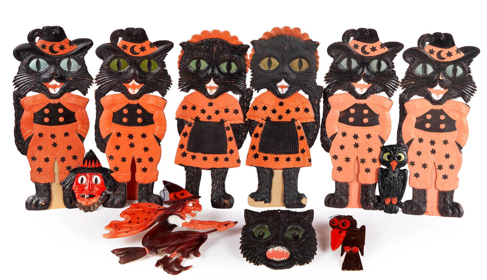 Collection of German Halloween die cuts: Collection of German Halloween die cuts, to include crows, a witch on a broom, five large dressed cats, a cat face, and a witch face, tallest - 19 1/2''.