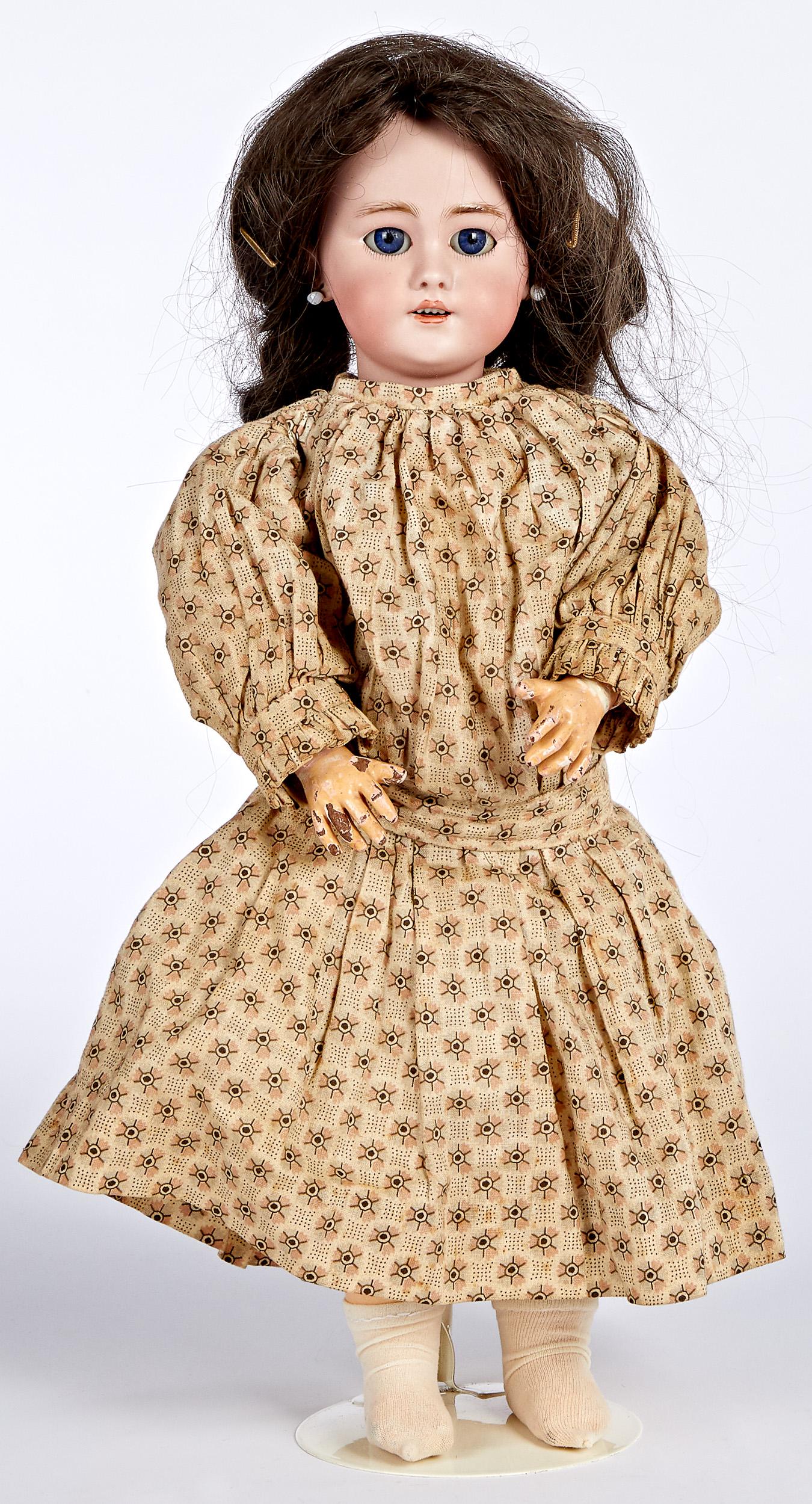 Tete Jumeau no. 7 bisque head doll: Tete Jumeau no. 7 bisque head doll, the socket head with red ink stamp Tete Jumeau, with incised DEP 7 near neck base, blue glass sleep eyes, molded and painted brow, open mouth with upper row of teet