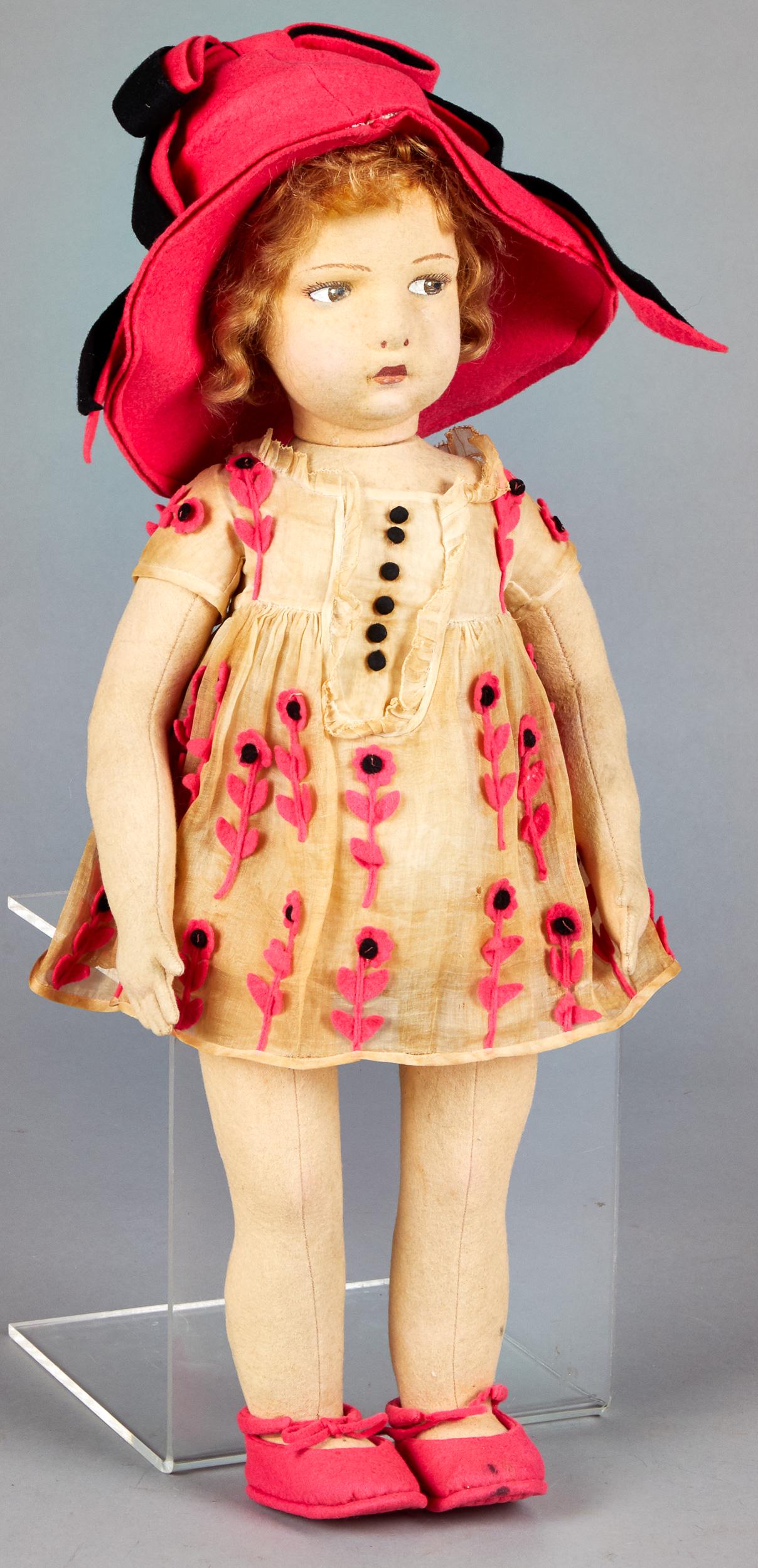 Lenci felt doll: Lenci felt doll, with hollow torso, swivel head, with side glancing eyes, closed mouth, with shaded bottom lip, dressed in a flower decorated organdy dress with teddy and matching hat, with quilted bo