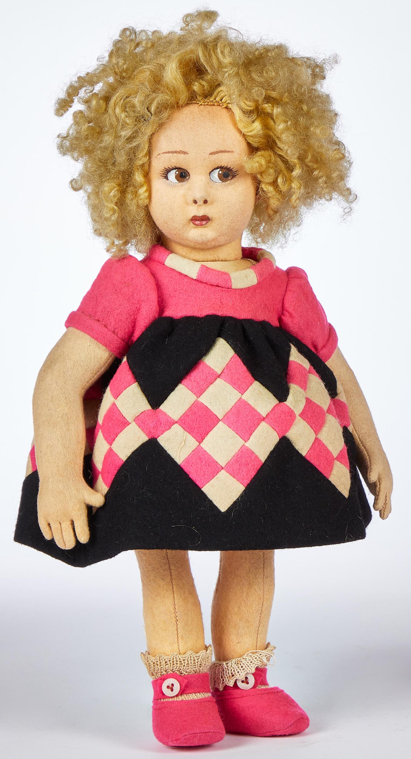 Lenci 111 series felt doll: Lenci 111 series felt doll, with a stuffed torso, swivel head with Shirley Temple curls, painted side glancing eyes with lashes, and closed mouth, dressed in a geometric pattern dress, with organdy sl