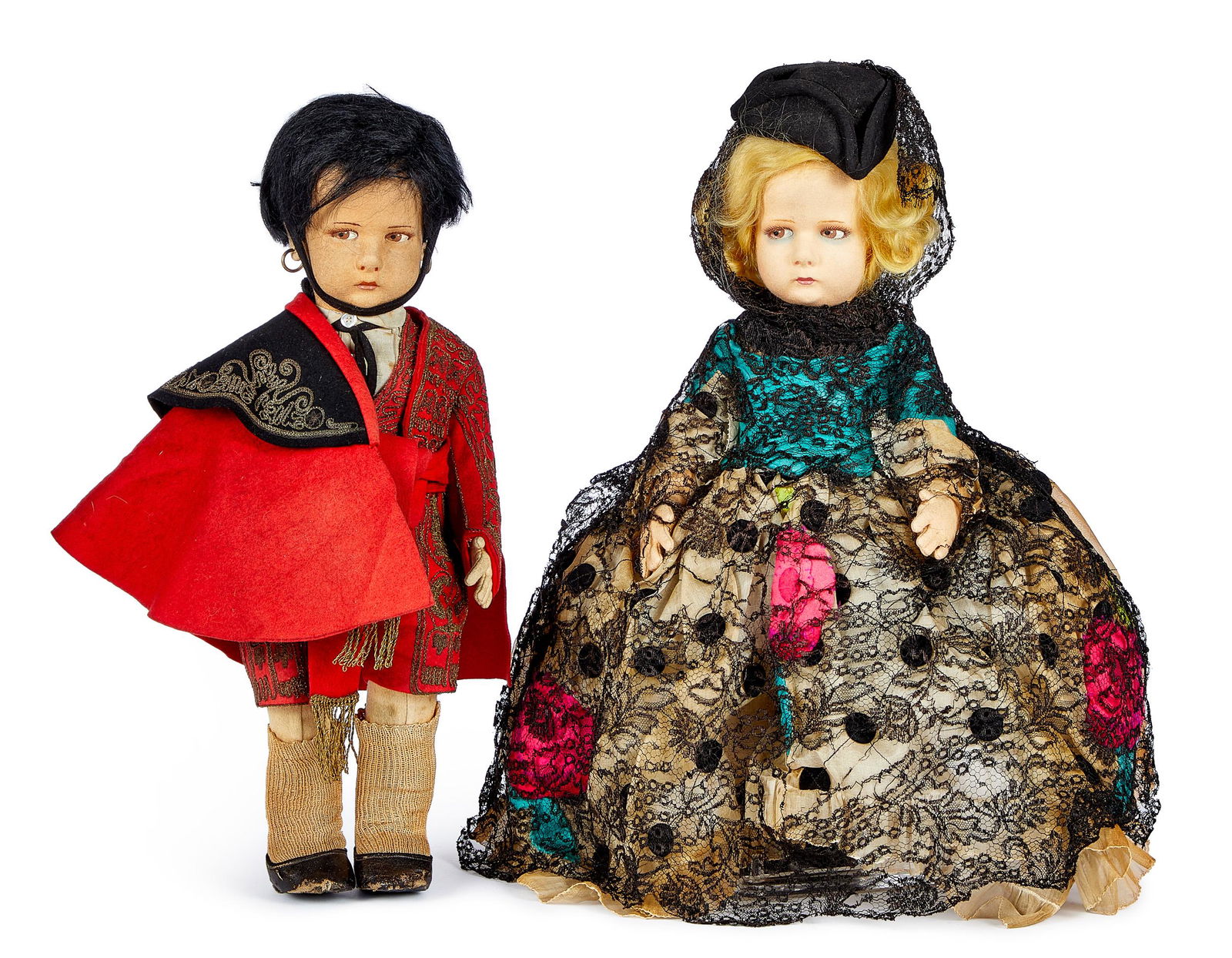 Lenci Spanish costume felt dolls: Lenci Spanish costume felt dolls, with hollow torso, swivel heads, painted side glancing eyes and closed mouths, the boy dressed in matador outfit with Lenci ribbon label in back of jacket, the girl i