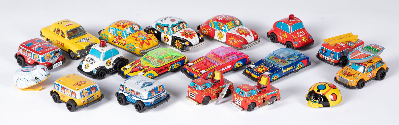 Eighteen Japanese wind-up and friction toys: Eighteen Japanese tin lithograph wind-up and friction toys, longest - 6 1/4''.