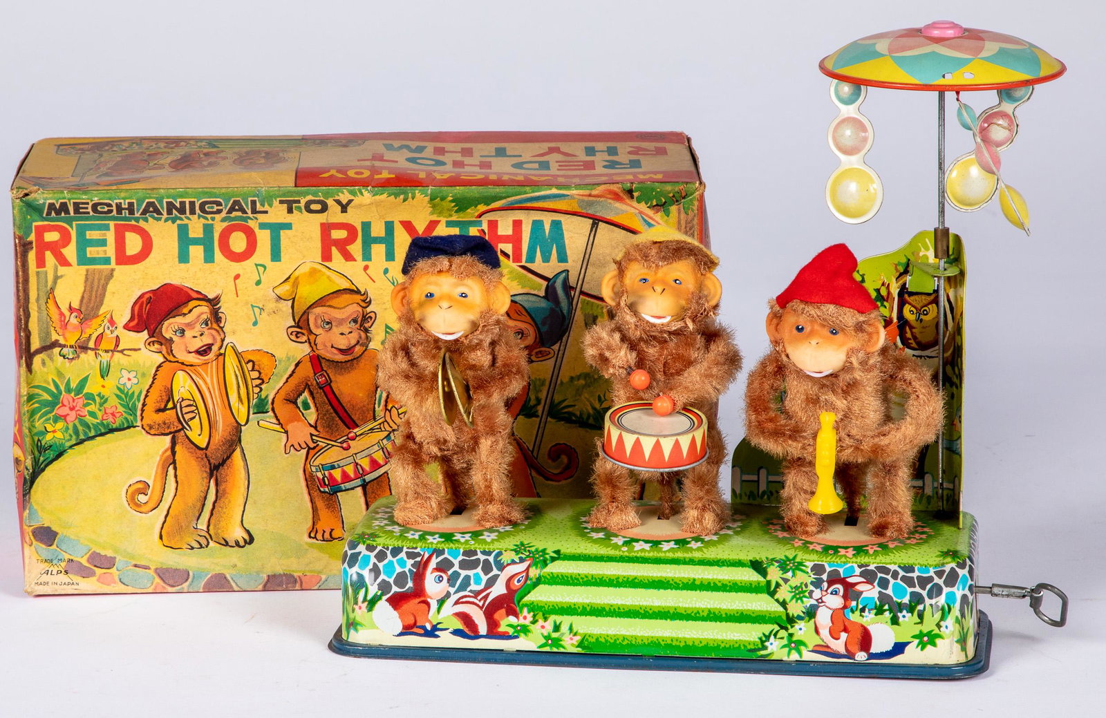 Alps battery operated Red Hot Rhythm monkey band: Alps battery operated Red Hot Rhythm monkey band, in the original box, 10'' w.