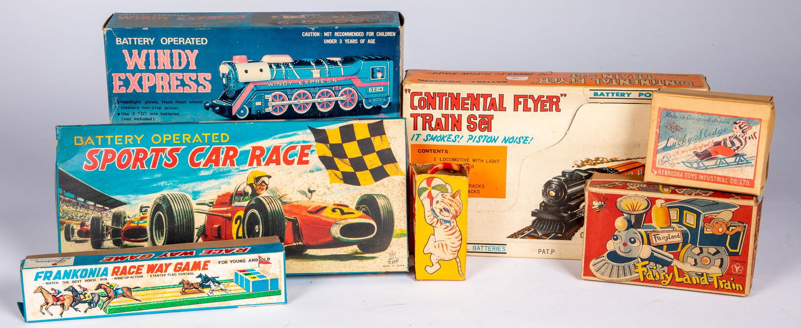 Group of Japanese tin mechanical toys: Group of Japanese tin mechanical toys, in original boxes, to include a TPS battery operated Sports Car Race, battery operated Continental Flyer Train Set, battery operated Windy Express, tin windup Fr