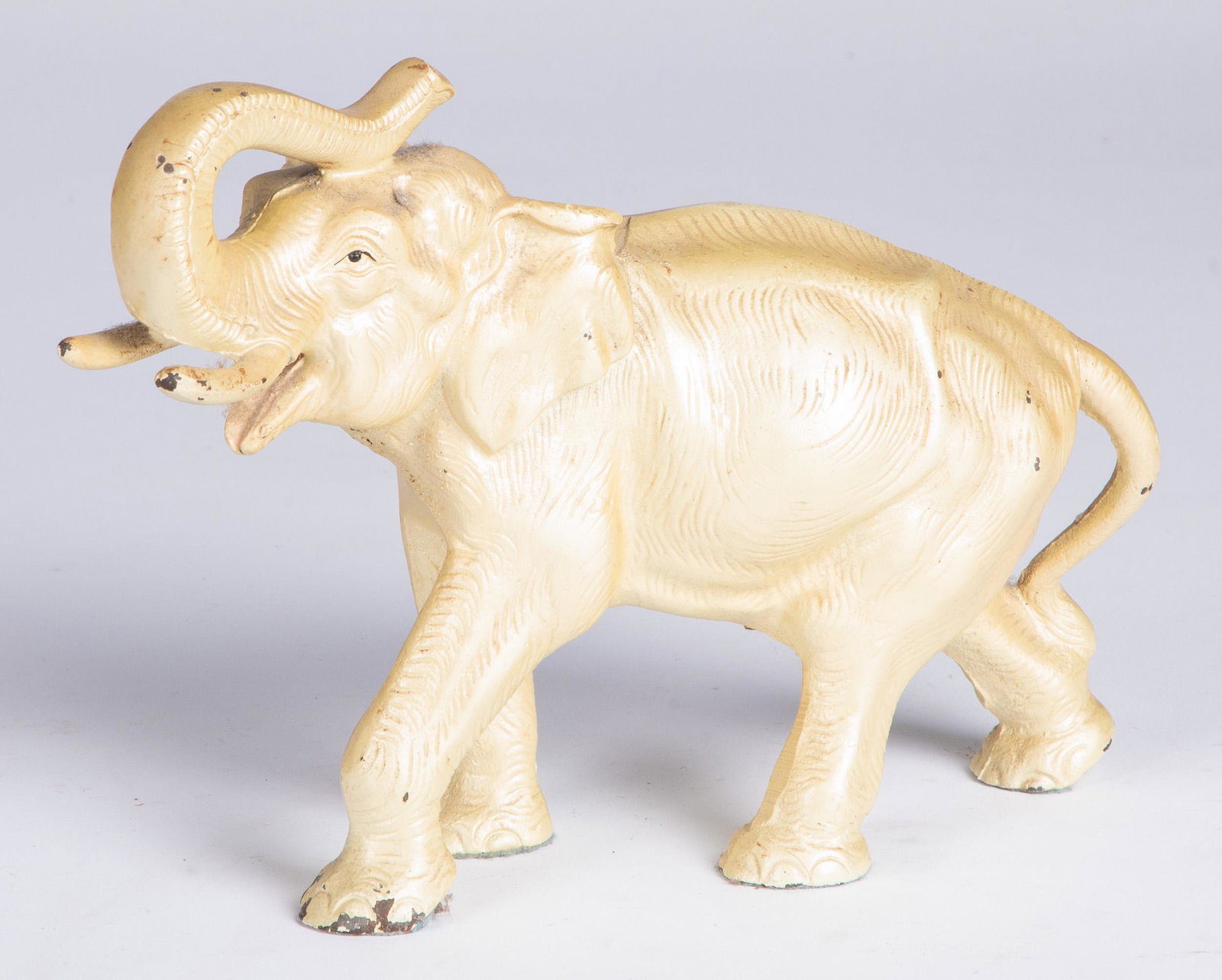 Painted cast iron elephant doorstop: Painted cast iron elephant doorstop, 8 1/4'' l.