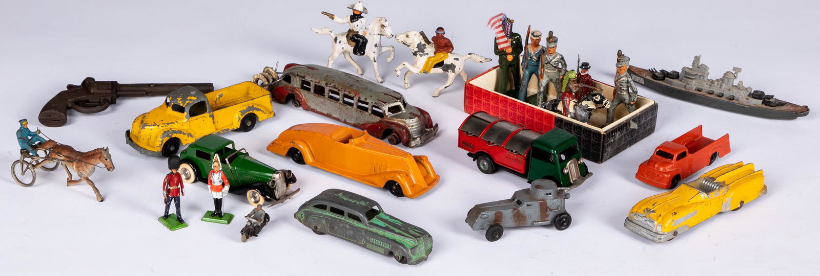 Group of diecast cars, etc.: Group of diecast cars, to include Tootsie Toys, Metal Masters and Mimic, together with a Tootsie Toy battleship, small lead soldier figures, horse and sulky, and a cast iron Comet cap gun.