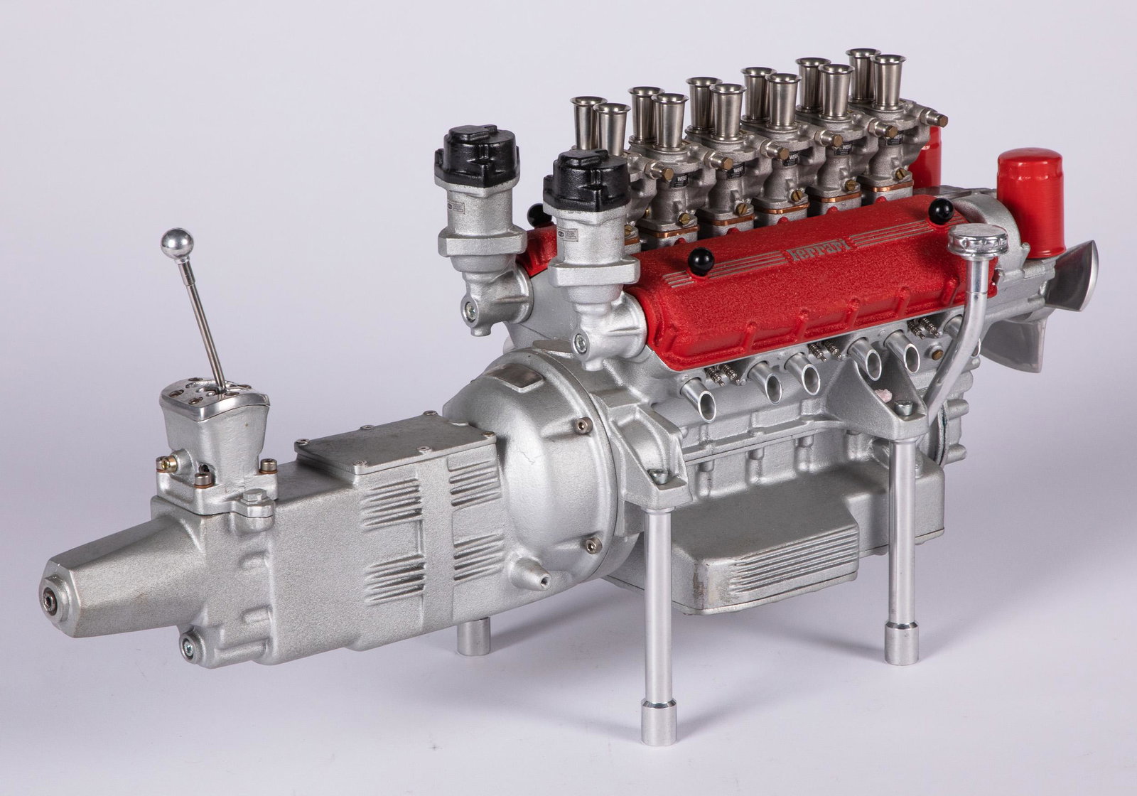 Aluminum Ferrari engine and transmission model: Cast aluminum Ferrari engine and transmission model, by Terzo Dalia, 22'' l.