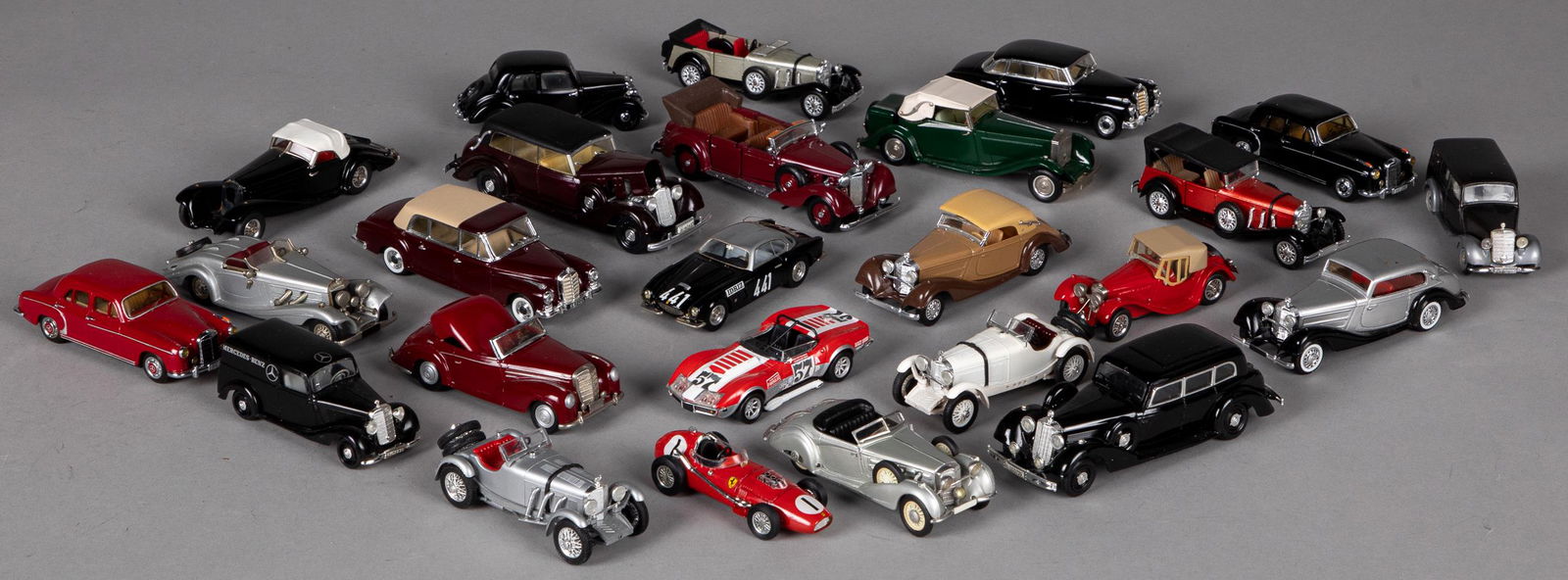 Twenty-five diecast scale model cars: Twenty-five diecast scale model cars, to include Schuco, Vitesse, Century, CCC, Rio, WM, Solido, Western Models, etc., longest - 5 1/2''.