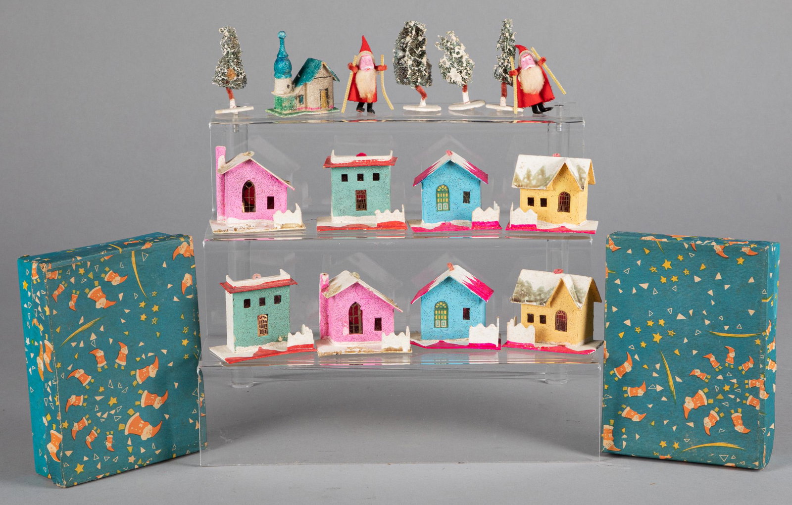 Group of German putz animals, etc.: Group of German putz animals, to include composition, spelter, stick leg, etc., together with a group of Japanese Christmas houses and pipe cleaner Santa's, in original box.