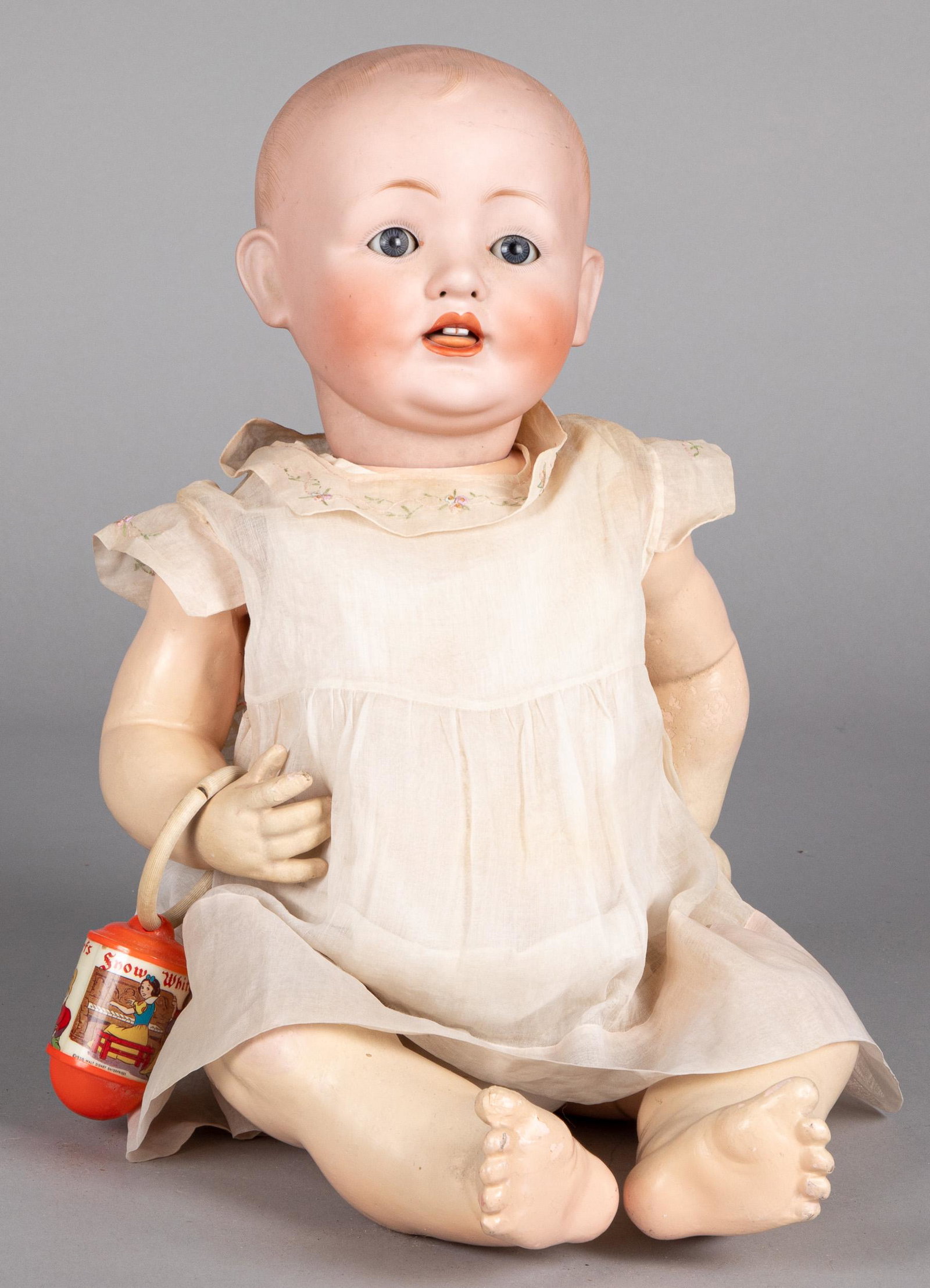 Franz Schmidt bisque head doll: Franz Schmidt bisque head doll, the head incised 1272/65, with jointed composition body, sleep eyes, and open mouth with teeth, 28'' h.